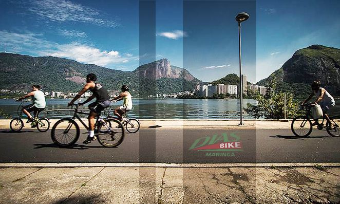 Pessoas pedalando próximo ao rio